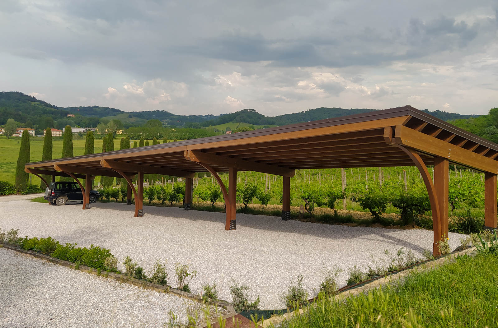 Tettoia per auto in legno Round per 12 posti auto