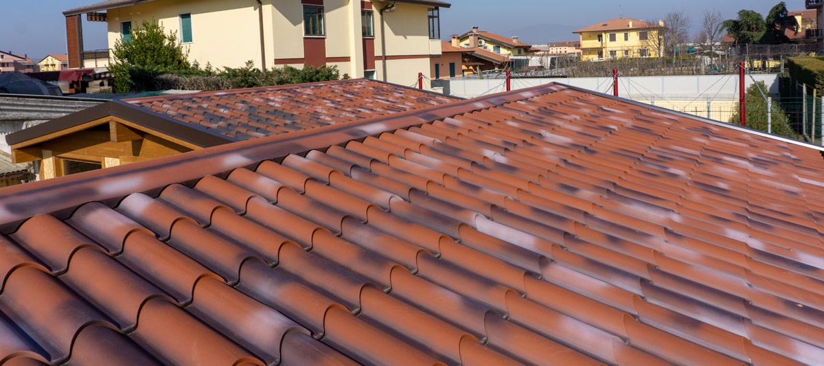 Copertura in legno con pannelli simil coppo anticati